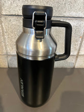 画像をギャラリービューアに読み込む, STANLEY(スタンレー) GO バキューム グロウラー 1.9L/64oz(マットブラック)　※他メーカーのステッカー貼ってあります
